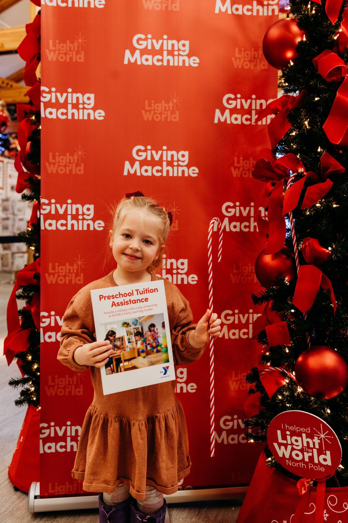 light the world giving machine north pole
